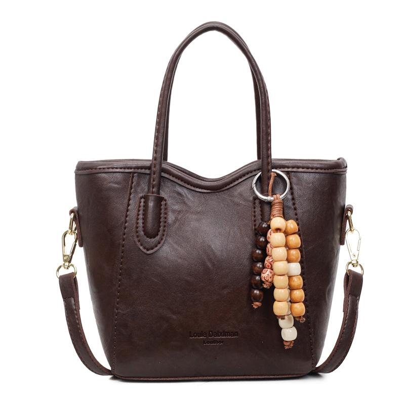 

Premium sense portable bucket bag women 2025 autumn and winter new versatile tote bag popular shoulder bag retro messenger bag no pendant