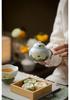 Hand-Painted Lotus Ceramic Teapot with Ball Hole Filter - New Chinese Style for Single Serve Tea Brewing