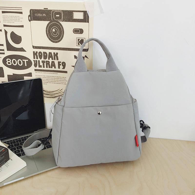 

Новый модный многофункциональный рюкзак для поездок на работу, водонепроницаемый, легкий, дорожная сумка через плечо, сумка на плечо, рюкзак большой вместимости серый