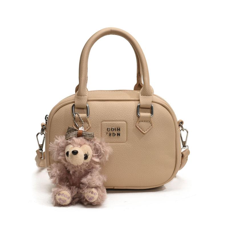 Early Spring Hot Sale French Niche Fashionable Portable Bowling Bag Solid Color Versatile Temperament Advanced Sense Messenger Women's Bag