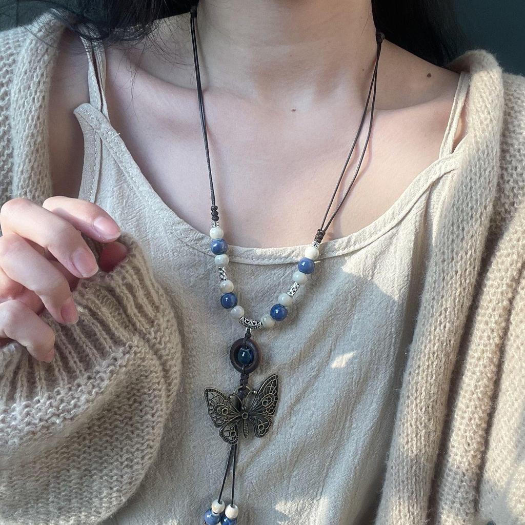 Bohemian Ethnic Style Long Bow Metal Necklace with Vintage Distressed Pendant (2025)