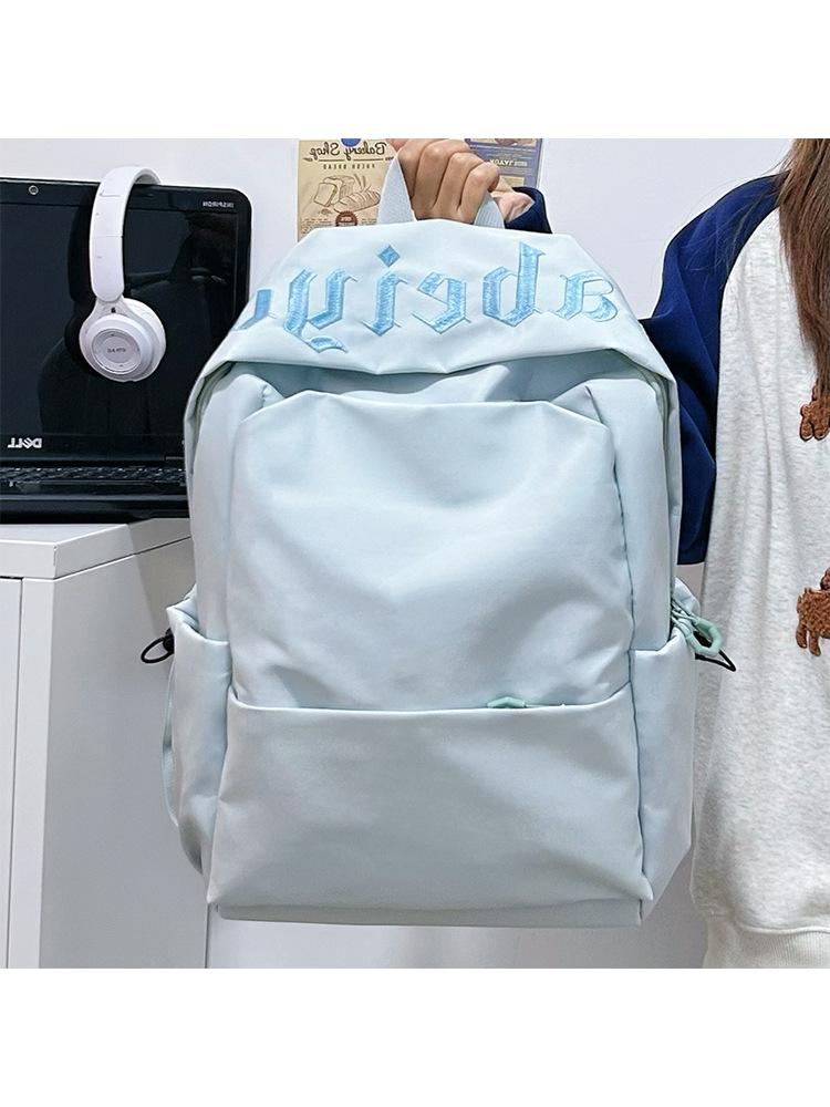 Schoolbag simple solid color middle and high school student schoolbag female 1011 new male large capacity backpack short trip backpack