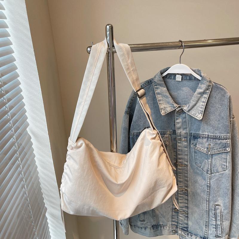 Canvas bag women's large-capacity new spring and summer casual solid color fashion shoulder messenger bag commuter tote bag