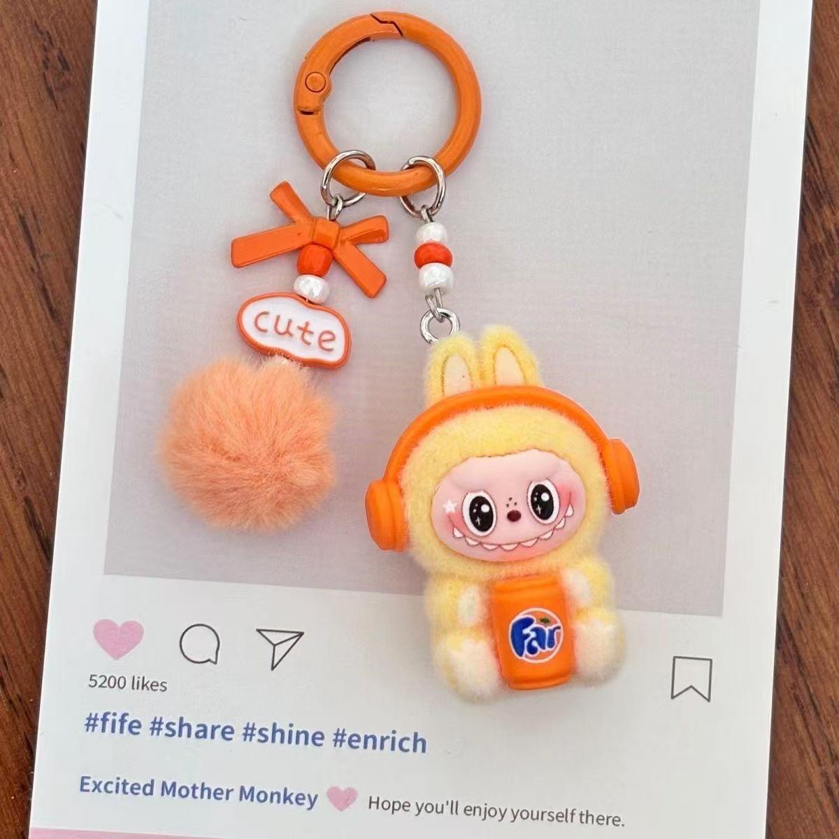

Soda Earphones Are Flocked, Cloth Doll Keychain Pendant, Accessories Doll Cartoon Ornament Comes with a keychain