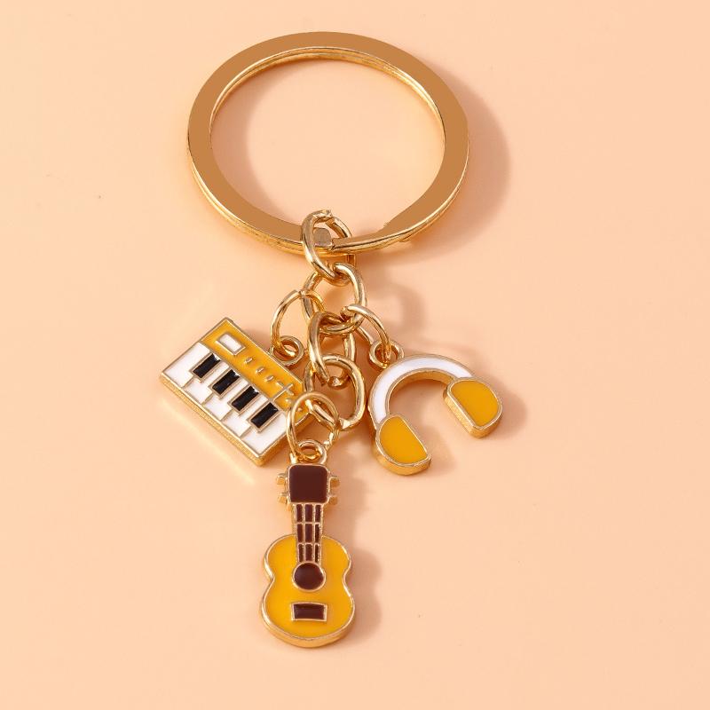 Niedlicher Emaille Mini-Klavier Schlüsselanhänger Simulation Musikinstrumente Schlüsselring Anhänger Damen Mädchen Handtaschen Dekoration DIY Schmuck Geschenk