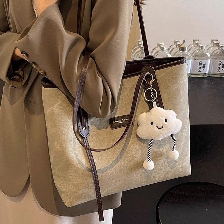 Golden Jade Bird Large Capacity Bag Women's 2025 New Premium Denim Shoulder Bag Commuter Bag Popular Tote Bag