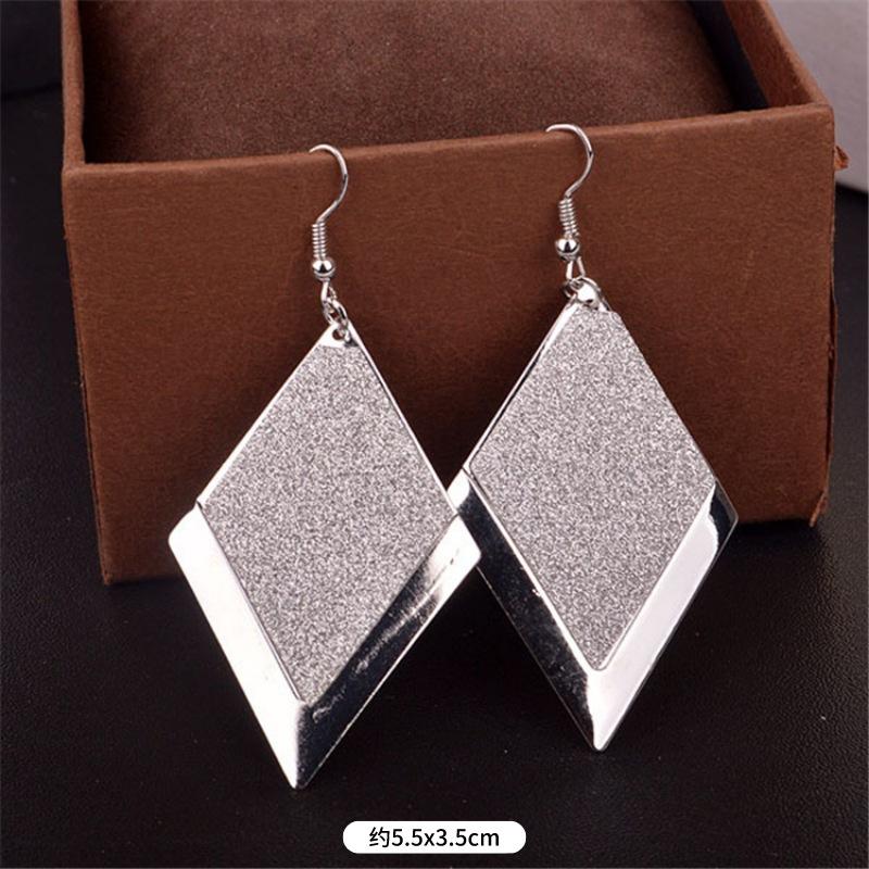 Fashion exaggerated niche temperament fringed earrings retro personality versatile sequined earrings women's long ear jewelry