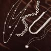 Böhmische Dame Perle mehrschichtige Blume Schleife Herz Halsband kurze ultrafeine Schlüsselbeinkette Halskette