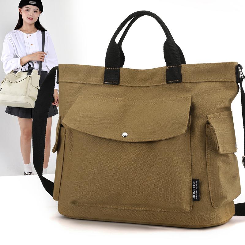 New Canvas Handheld Women's Bag 2025 Large Capacity Solid Color Canvas Commuting and Leisure Shoulder Korean Version Tote Bag