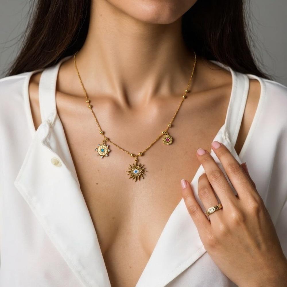 

18K Gold-Plated Blue Eyes Drip Necklace: Retro Luxury Clavicle Chain for Women
