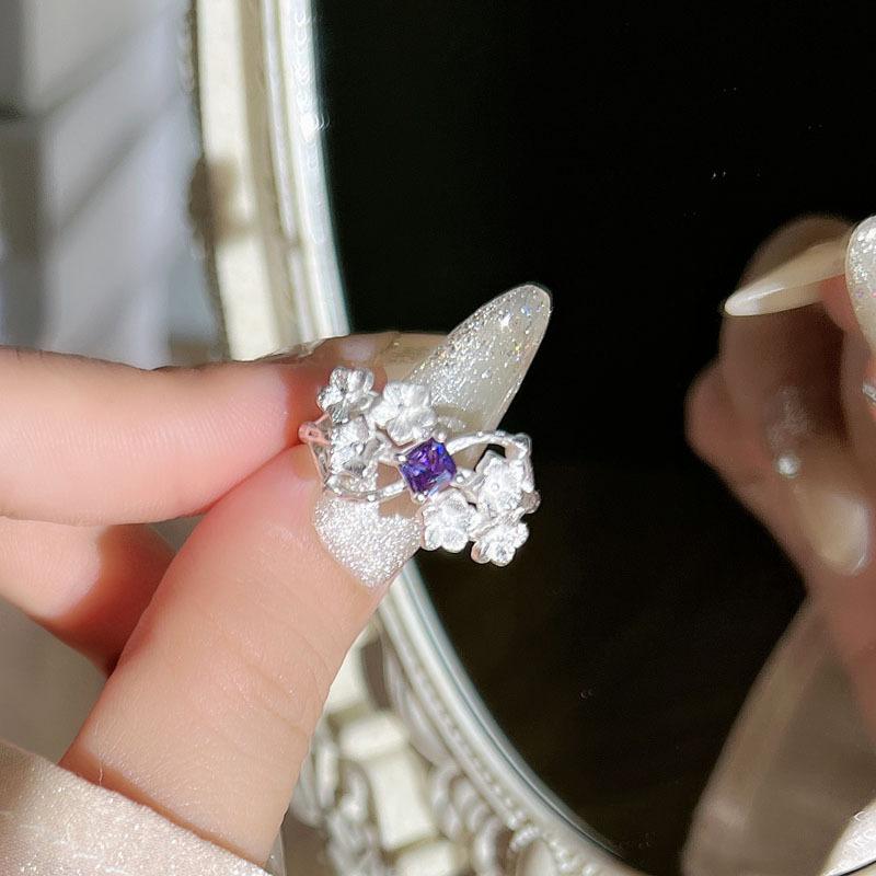 Beautiful silver-plated matte purple diamond flower ring, new light luxury star wreath, hollow butterfly tassel temperament ring