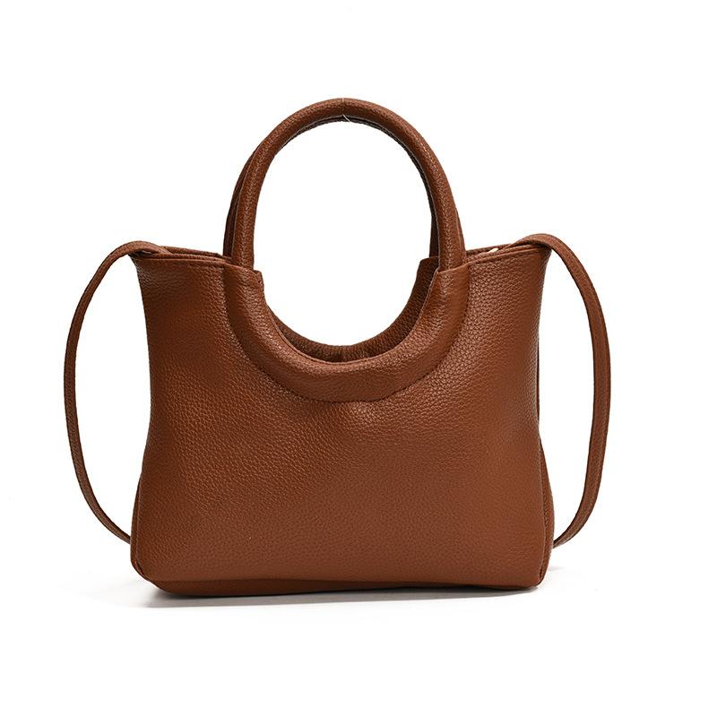 

Simple early autumn new solid color Korean version 2024 foreign style soft surface retro shoulder crossbody ring portable women s bag коричневий