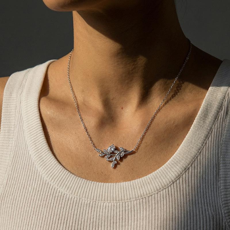 European and American titanium steel natural stone jewelry set, leaf zircon necklace, ring earrings, women's niche high-end sense does not fade