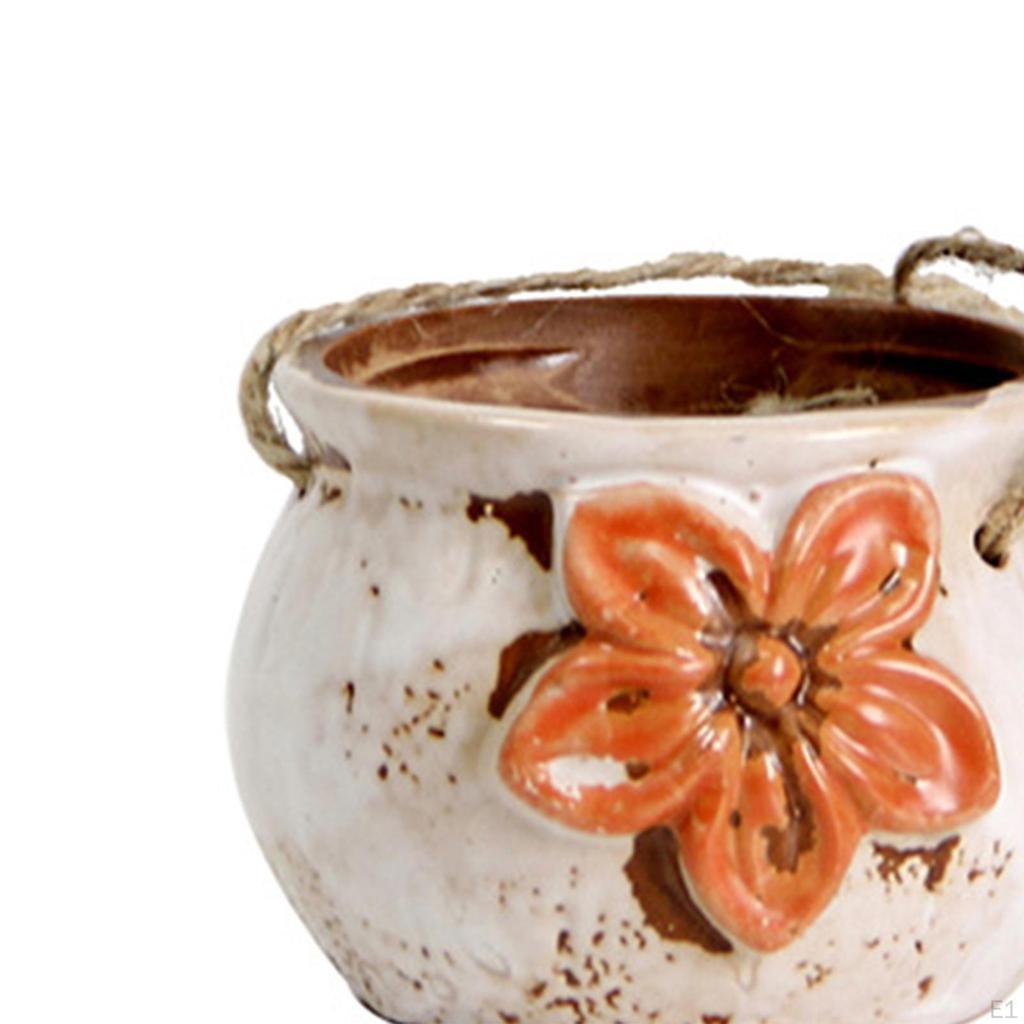 Elegant Hanging Ceramic Planter for Outdoor Spaces