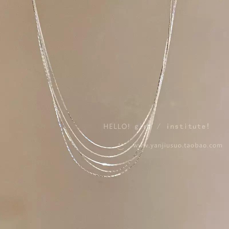 Multi-layer stacked snake bone necklace female high-end sense light luxury silver metal collarbone chain ins wind versatile explosion