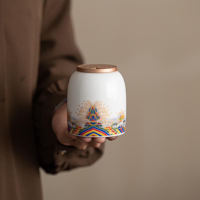 

Suet jade porcelain high white porcelain seawater Jiangya tea can high-grade portable small Dunhuang mini tea warehouse sealed jar