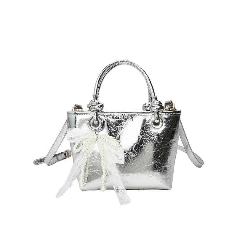 

Simple hand-carried bucket bag spring new high-end fashion shoulder bag niche trendy versatile messenger bag срібний