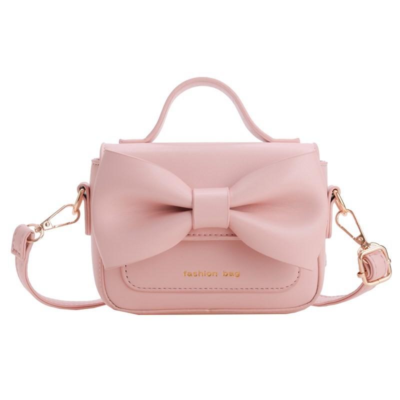 Pu Charming Mini Handbag For Girls And Boys With Delightful Bow Design For School Use