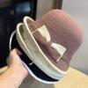 New women's autumn and winter Korean-style two-tone bow fisherman hat, elegant and warm knitted hat for middle-aged and elderly, trendy
