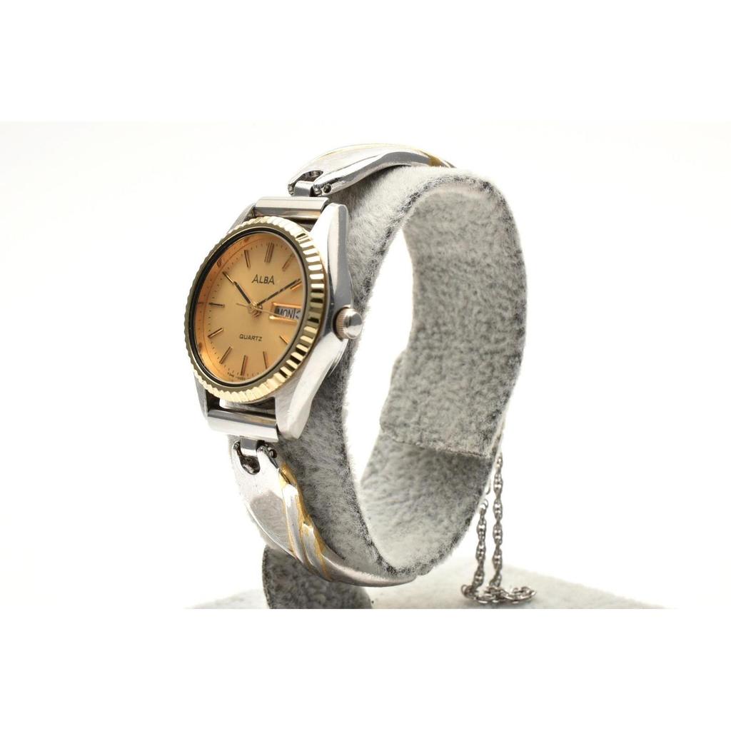 Used Good Condition SEIKO Alba V248-0100 Quartz Day Date Gold Dial Stainless Steel x Gold Color 1990's Ladies Watch Working Item