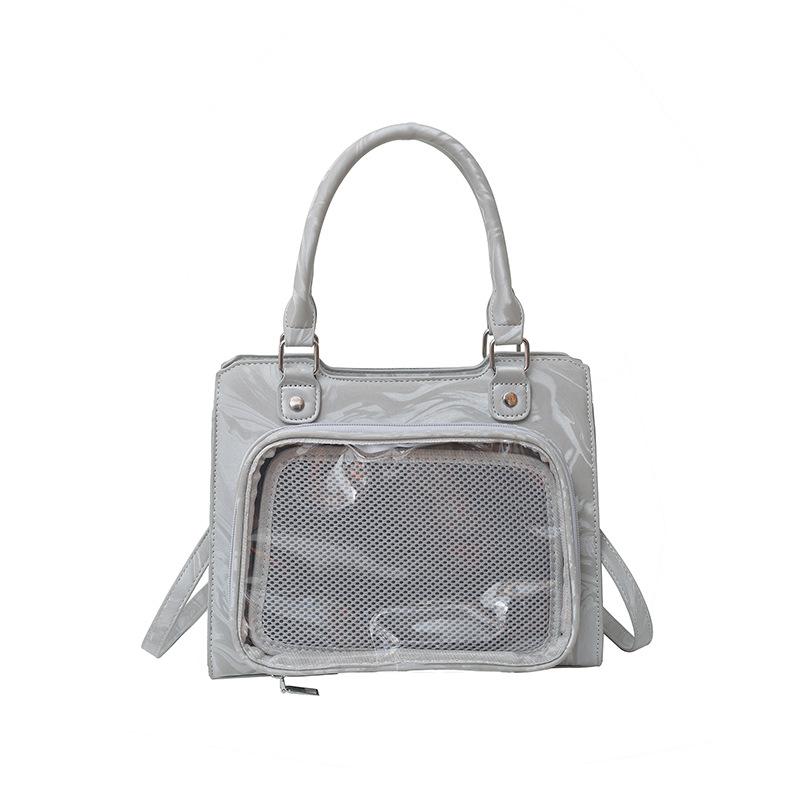 

Japanese two-dimensional yuan handbag woman 2025 new girl soft girl shoulder crossbody pain bag portable commuter bag woman серый