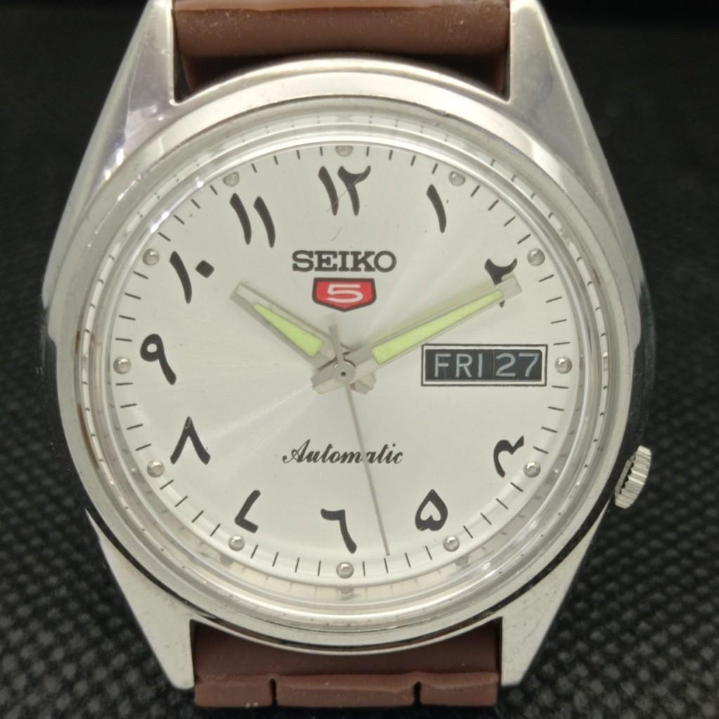 USED VINTAGE SEIKO 5 AUTO JAPAN MENS DAY/DATE ARABIC SILVER WATCH 603-a313774-2 SKU603-a313774