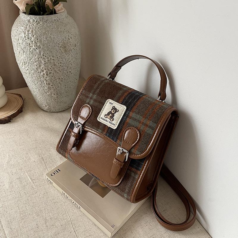 Autumn and winter niche backpack women's new commuter retro versatile backpack mini schoolbag