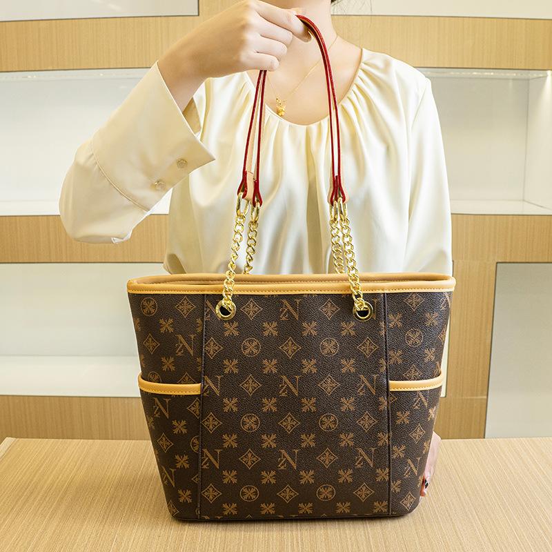 

Сумка-шоппер нового стиля для поездок на работу, большой вместимости, модная и универсальная, с принтом, на цепочке для ношения под мышкой, ретро-сумка-тоут