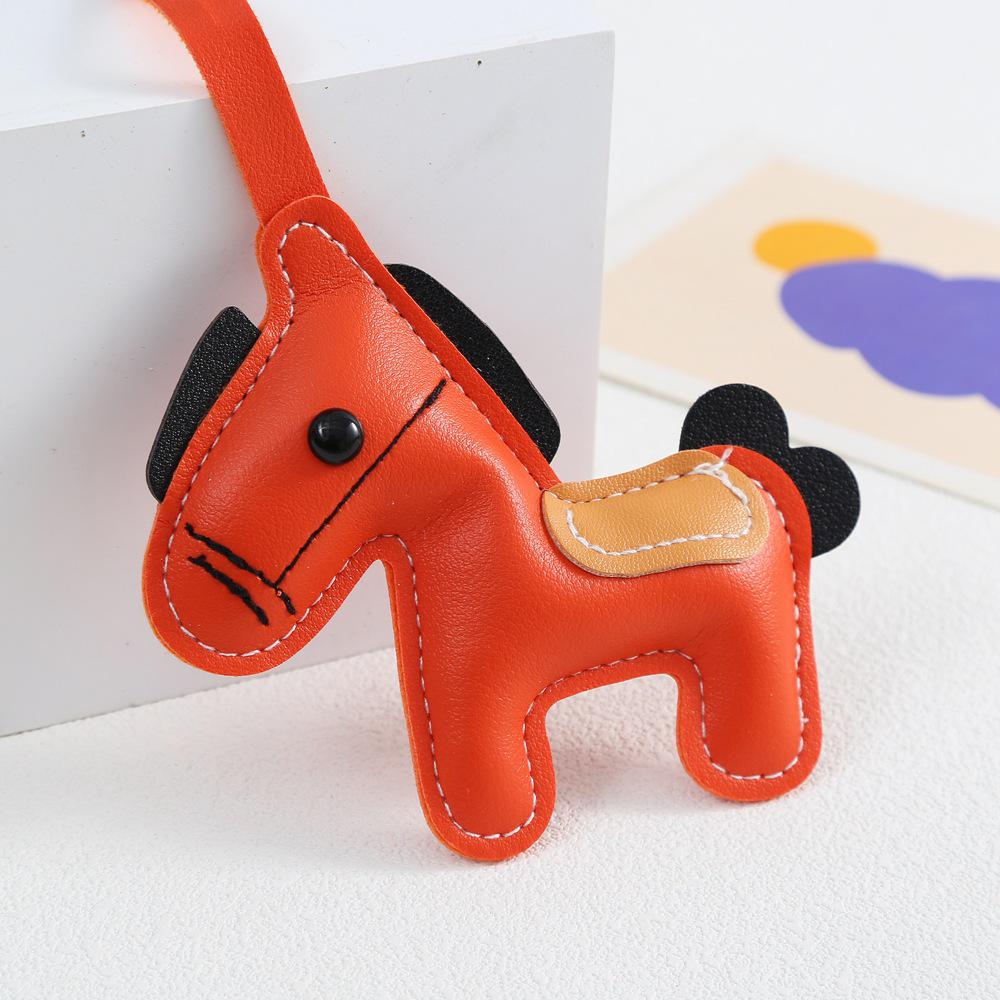 Neuer reicher Stil Lederpuppen-Rucksack Schlüsselanhänger Schmuck