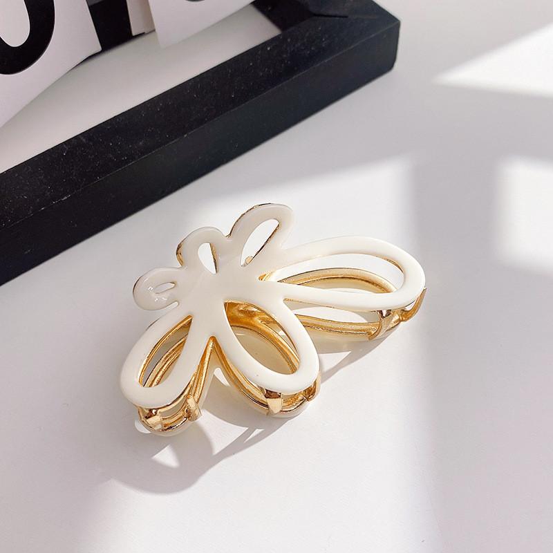 

Elegant Butterfly Design Hair Claw For Women In Various Stylish Colors And Sizes White Small