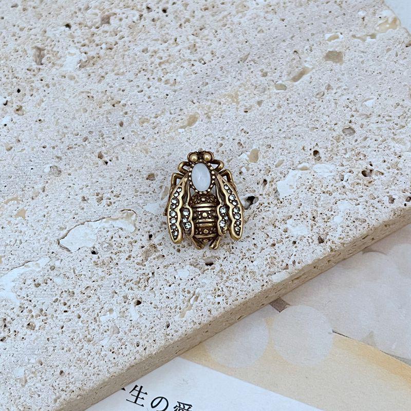 European & American Fashion Asymmetrical Matte Gold Rhinestone Spider Bee Stud Earrings