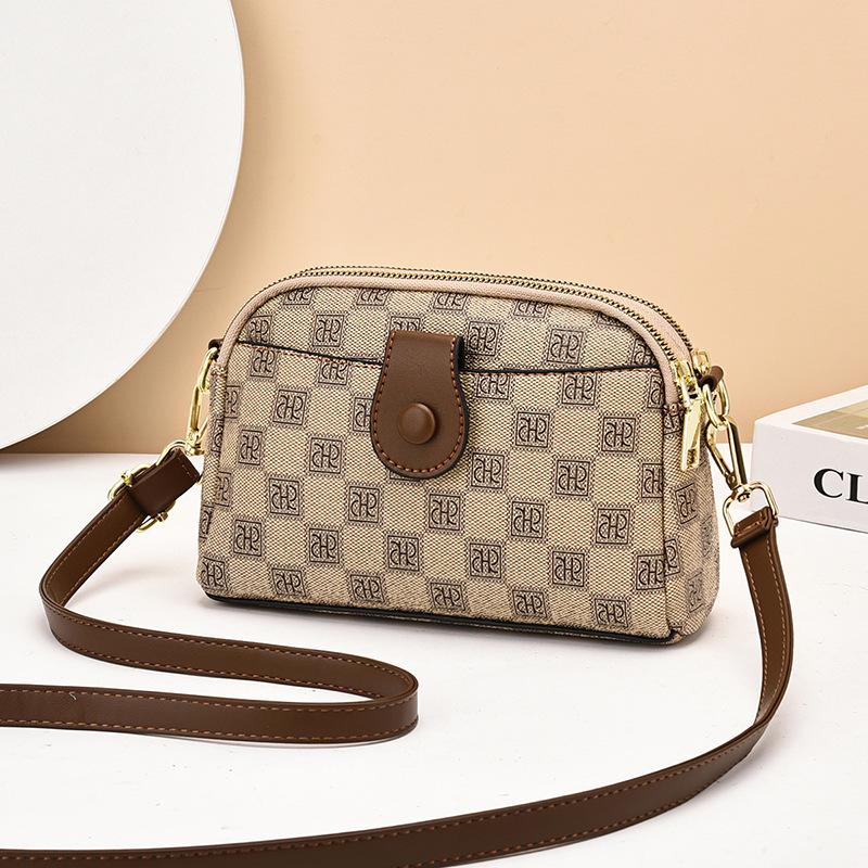 Kabelka dámská 2025 nová pu květinová dámská přenosná přes rameno messenger bag malá čtvercová kabelka high-end dámská kabelka trendy