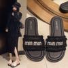 Xiaoxiangfeng Rhinestone Letter Flat-bottomed Slippers Women's Summer Wear 2025 New Internet Celebrity Fashion Fringed One-word Cool Slippers