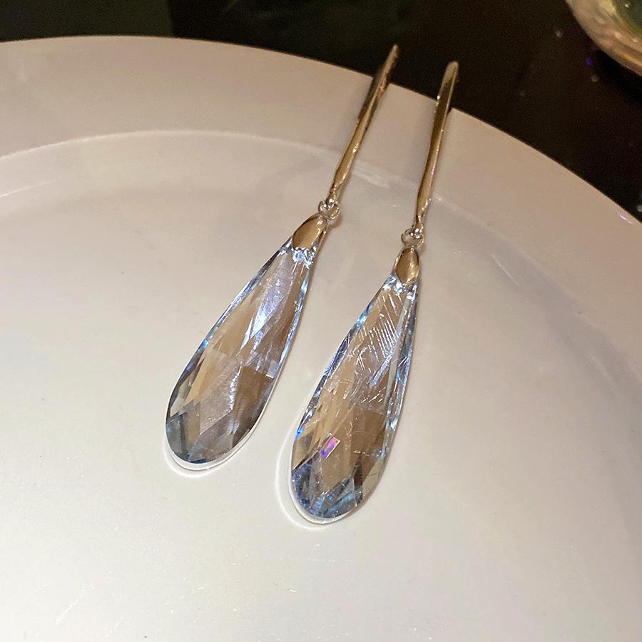 

Silver needle water drop simple fringed earrings fashion temperament versatile stud earrings light luxury high sense earrings design sense niche