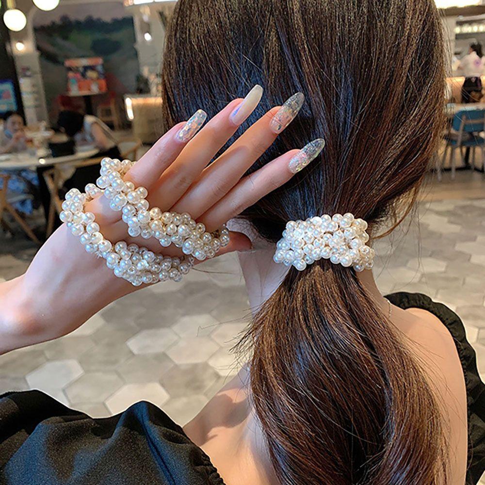 

Lovely bling bling pearl point beige-tone luxury hair tie