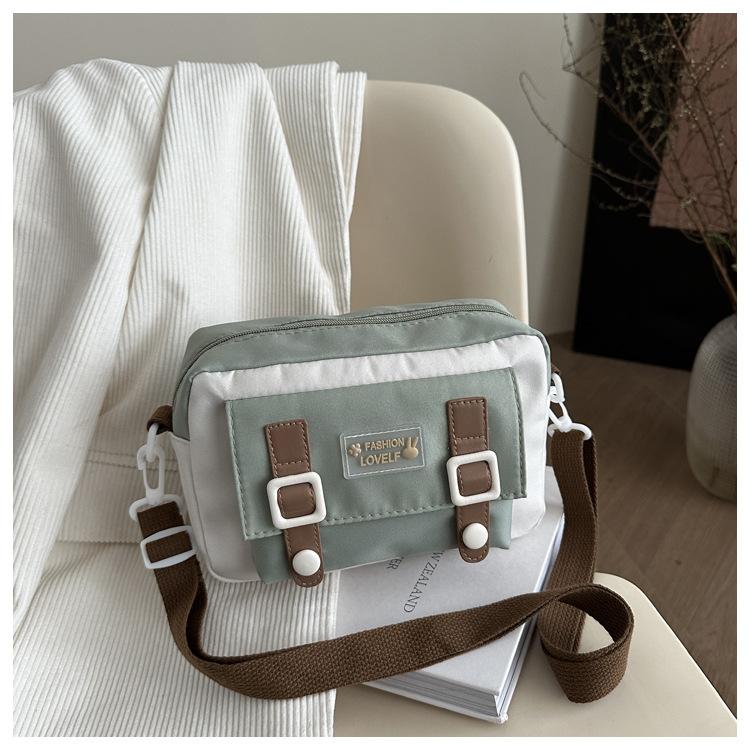 Cute canvas oblique span bag female niche vitality girl small fresh youth simple