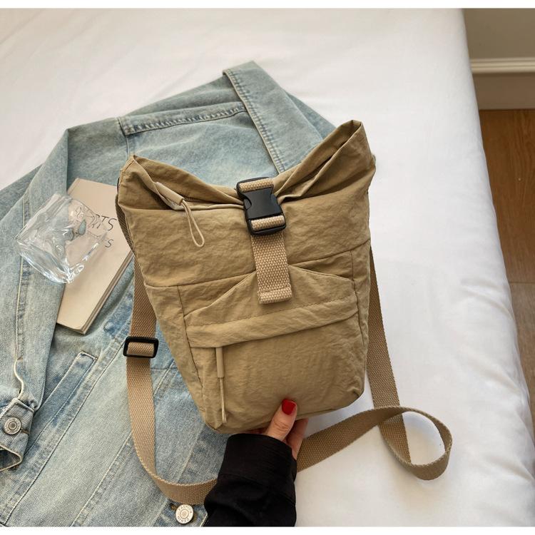 

Japan and Korea casual small satchel women s 2025 new lightweight canvas mobile phone collar wallet niche design shoulder messenger bag хаки