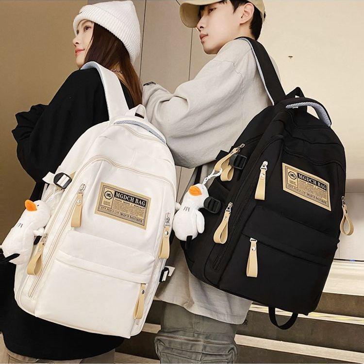 Schoolbag Multi-layer spine protection schoolbag Large capacity retro backpack 1011 New junior high school student high school student going out