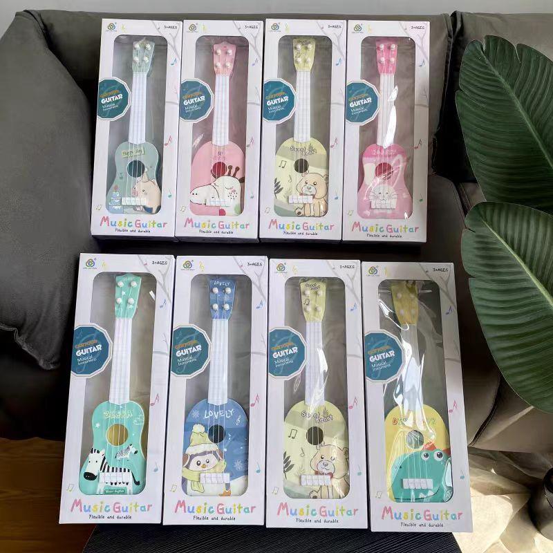 

Дитяче укулеле Інституційний подарунок Маленька гітара Освітня Іграшка для раннього розвитку Маленький подарунок Іграшка-гітара різнокольоровий