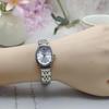 NAIDU Oval Dial Steel Band Women's Luxury Quartz Watch with Stick Markers