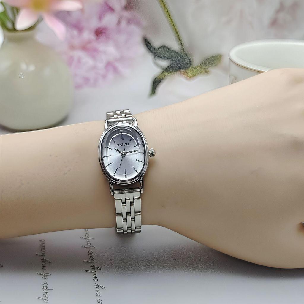 NAIDU Oval Dial Steel Band Women's Luxury Quartz Watch with Stick Markers