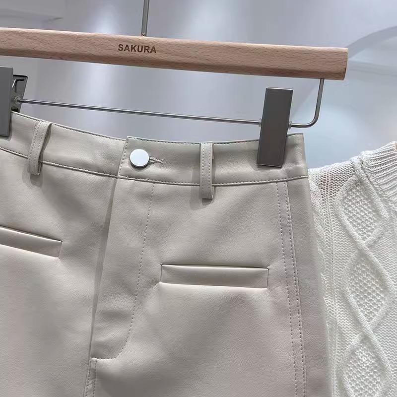 High-Waisted PU Leather A-Line Skirt - Korean Style, Single Button, Versatile Commuter 2024 Autumn/Winter Women's Short Skirt.
