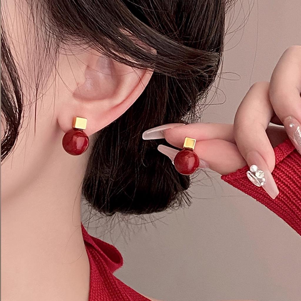 Wine red earrings, women's light luxury high-end earrings, 2026 new popular autumn and winter niche Chinese New Year earrings trend