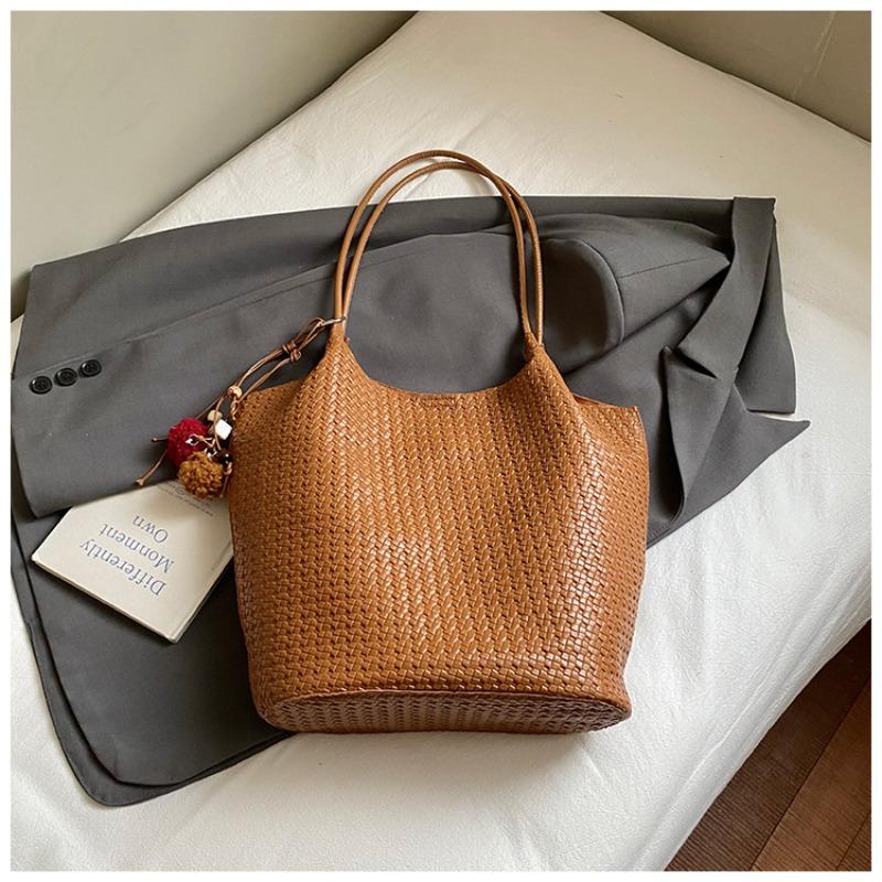 Autumn new texture braided pattern commuting simple large capacity retro solid color bucket armpit shoulder bag for women