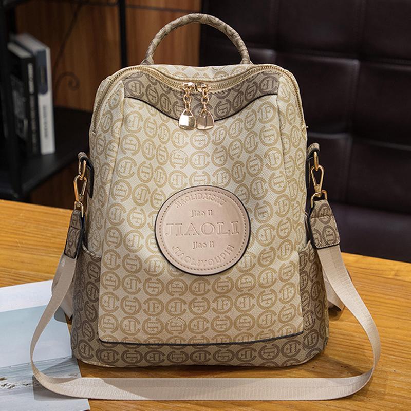 Nový slavný dámský batoh s retro potiskem Batoh Velkokapacitní Cestovní batoh Splash Vysoce kvalitní školní taška přes rameno z PU kůže