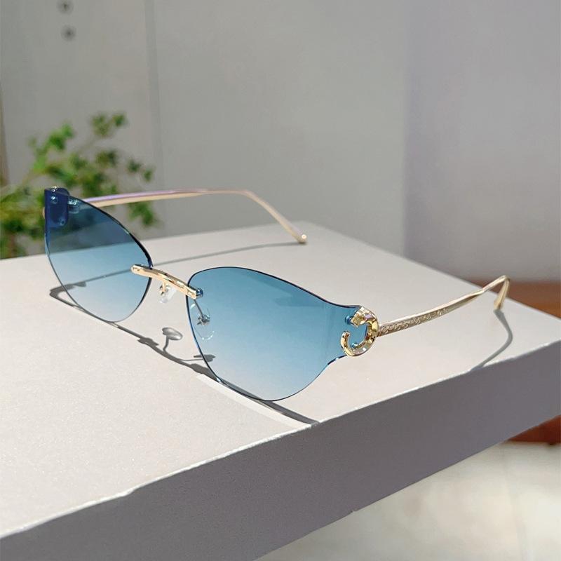 Popular Vintage Rimless Cat Eye Sunglasses Women For Men Luxury Brand Designer Sun Glasses Punk Metal Leopard Head Shades Uv