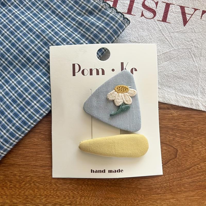 

Cute Cat-shaped Plaid Floral Hair Clips, soft fabric non-slip barrettes for daily and casual wear. Large Triangle Daisy