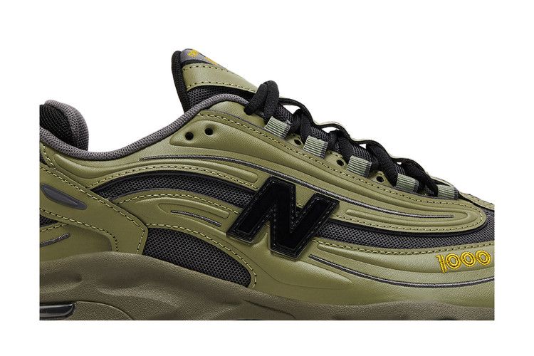 New Balance 1000 Dunkeloliv Magnet