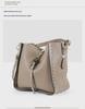 Women's Retro Rivet Cowhide Bucket Bag with Leopard Head Design