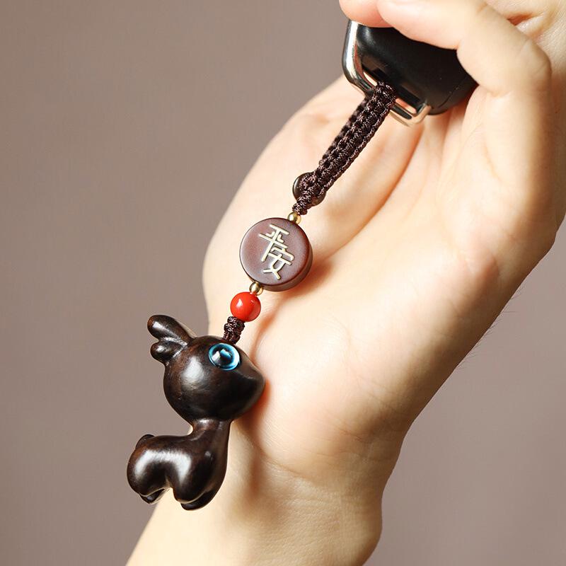 Cartoon Niedlicher Sandelholz Hirsch Schlüsselanhänger mit geflochtener Schnur für Männer und Frauen